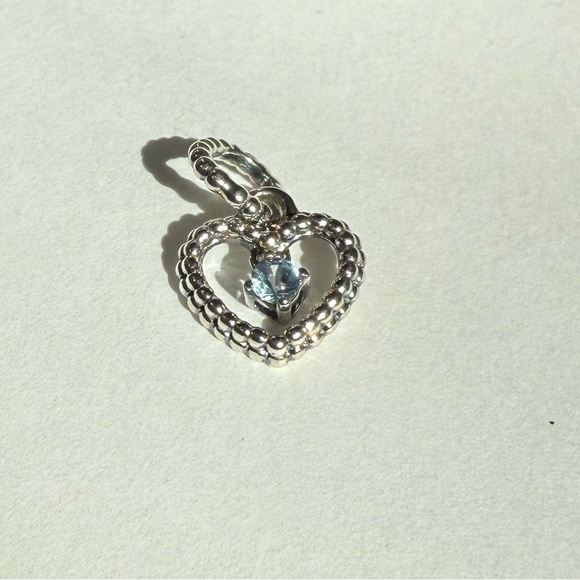 Pandora Jewelry - 💙 Pandora Silver Heart Dangle Charm with Icy Blue Gem – Elegant & Timeless 💙